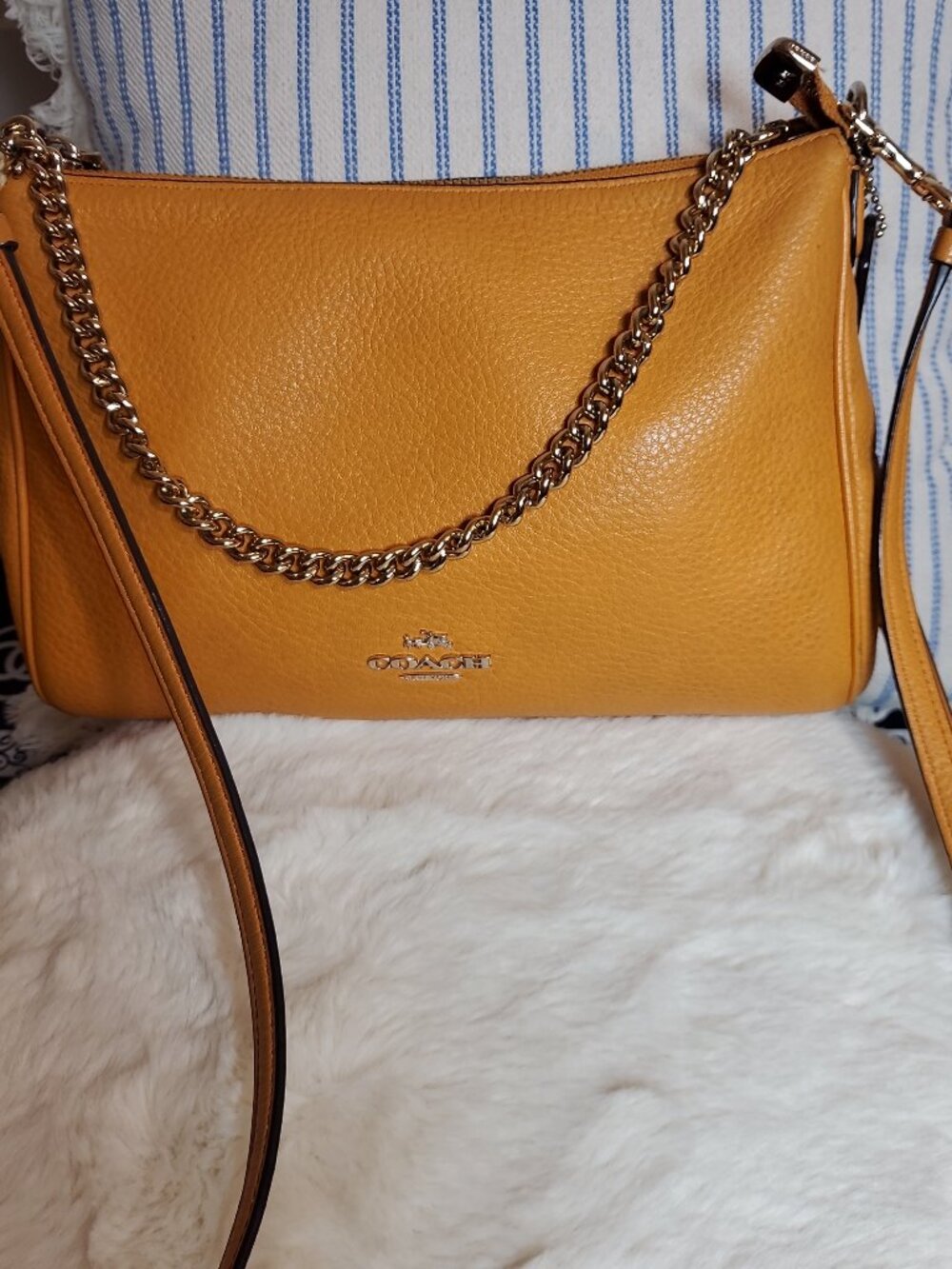 5. Authentic Coach yellow leather crossbody bag